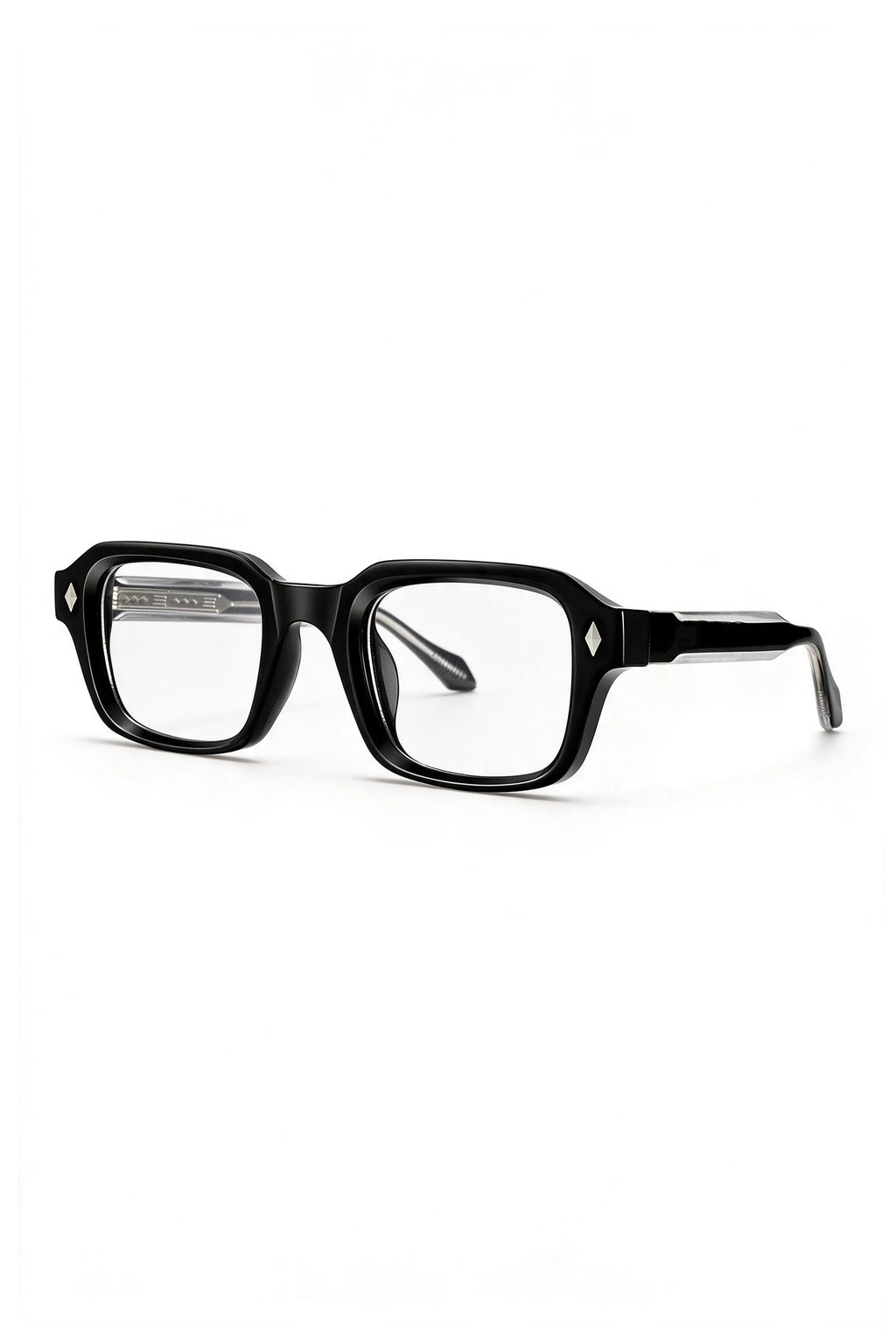 VELA Clear glasses three-quarter view showing the black-over-clear laminated temple and silver diamond stud