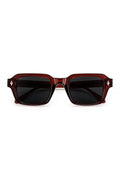 VELA Oxblood squared rectangular sunglasses in translucent oxblood with black lenses, front view on white