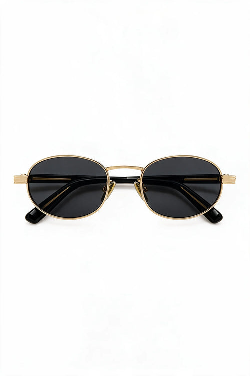 MARA oval sunglasses in black and gold with smoke lenses, front view