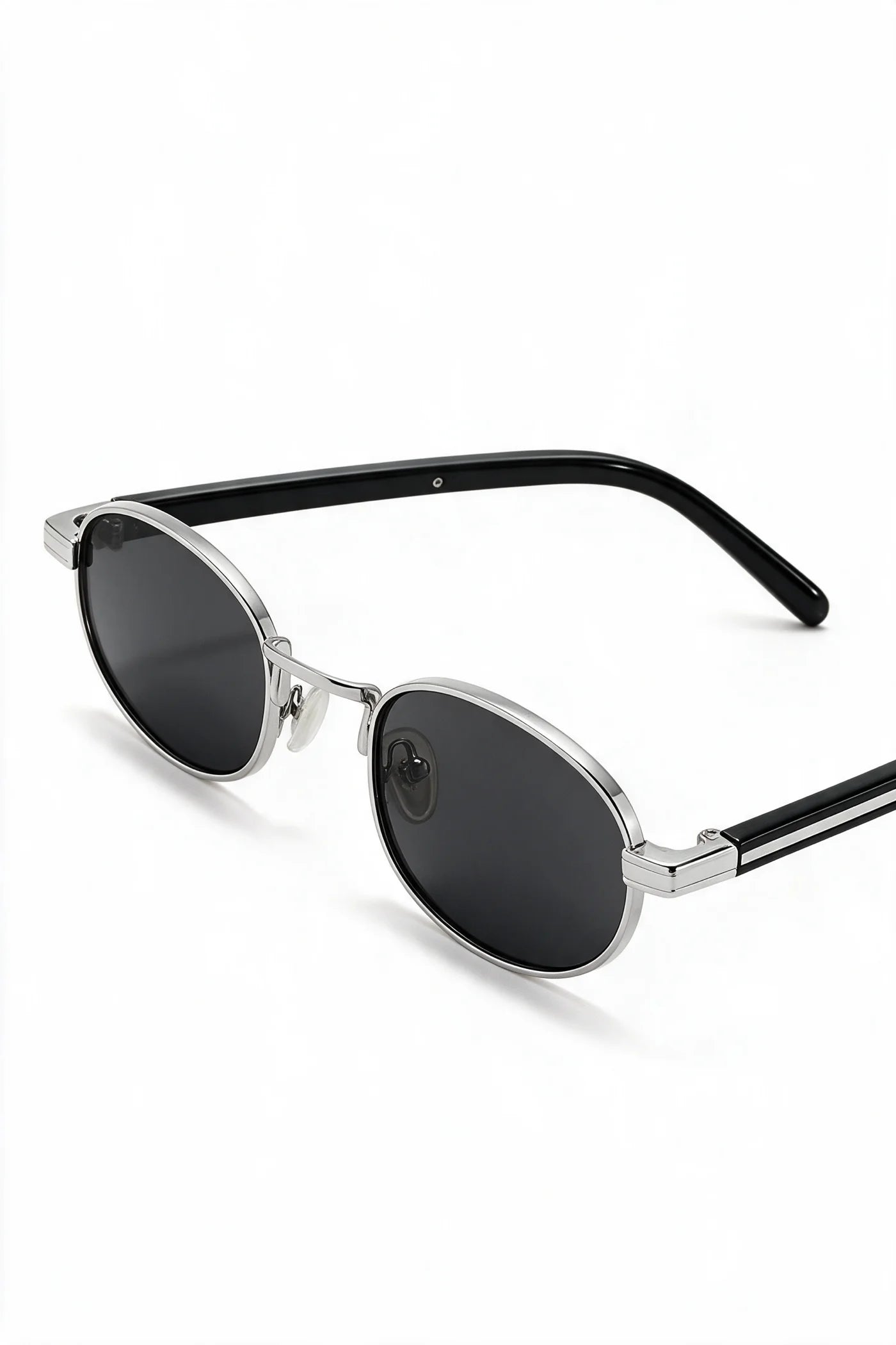 MARA oval sunglasses in black and silver, three-quarter view with temples open