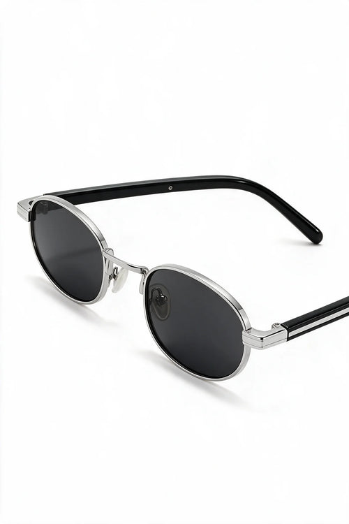 MARA oval sunglasses in black and silver, three-quarter view with temples open