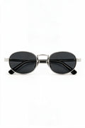 MARA oval sunglasses in black and silver with smoke lenses, front view