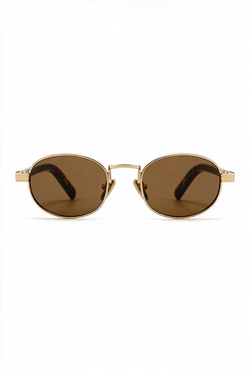 MARA oval sunglasses in gold with tortoiseshell temples and tea lenses, front view
