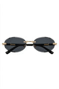 SERA rimless oval sunglasses with smoke black lenses and gold hardware, front view