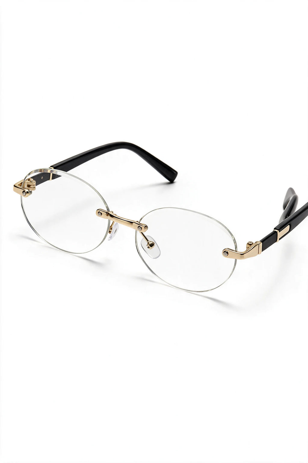 SERA rimless oval frames with clear lenses, three-quarter view with temples open
