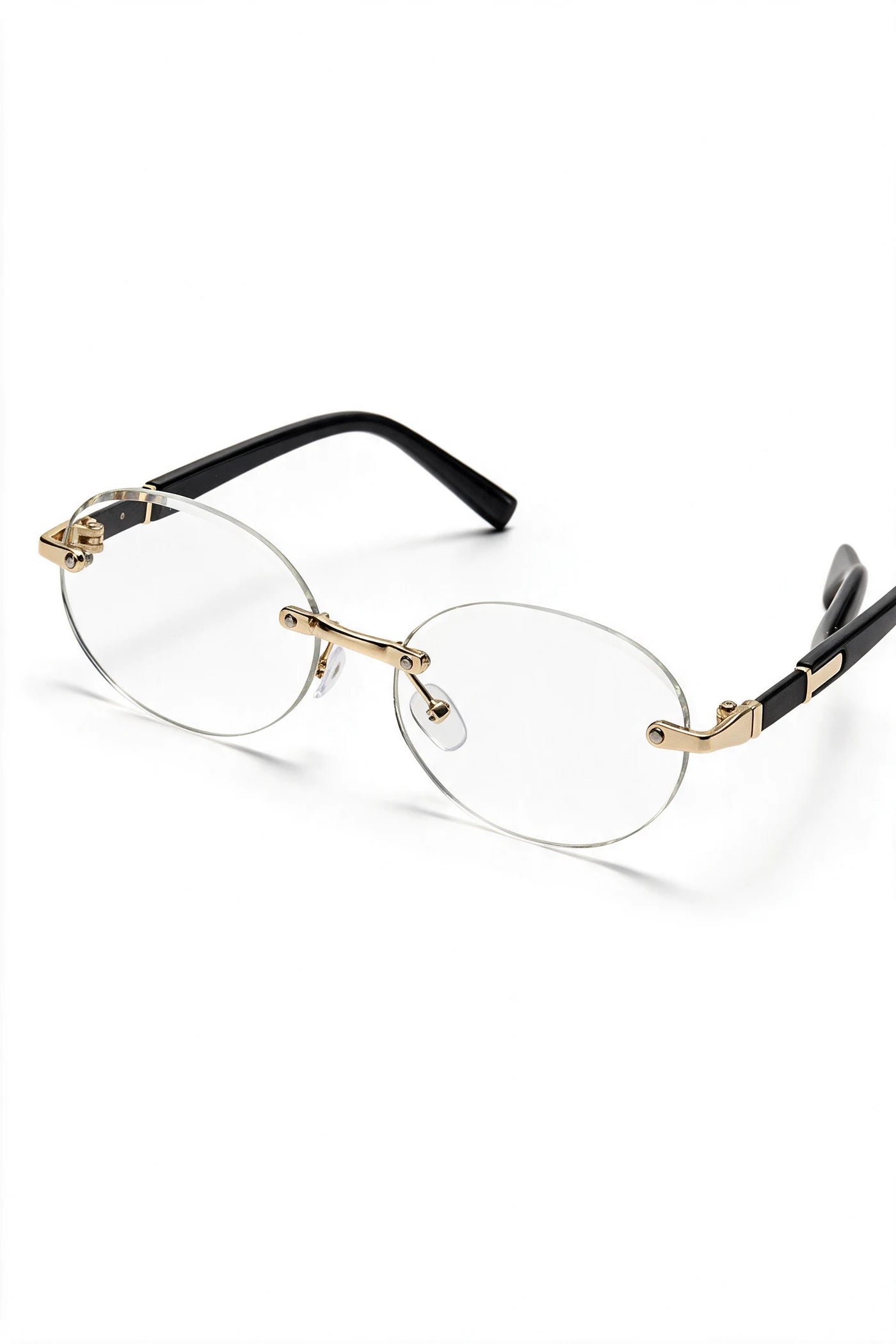 SERA rimless oval frames with clear lenses, three-quarter view with temples open