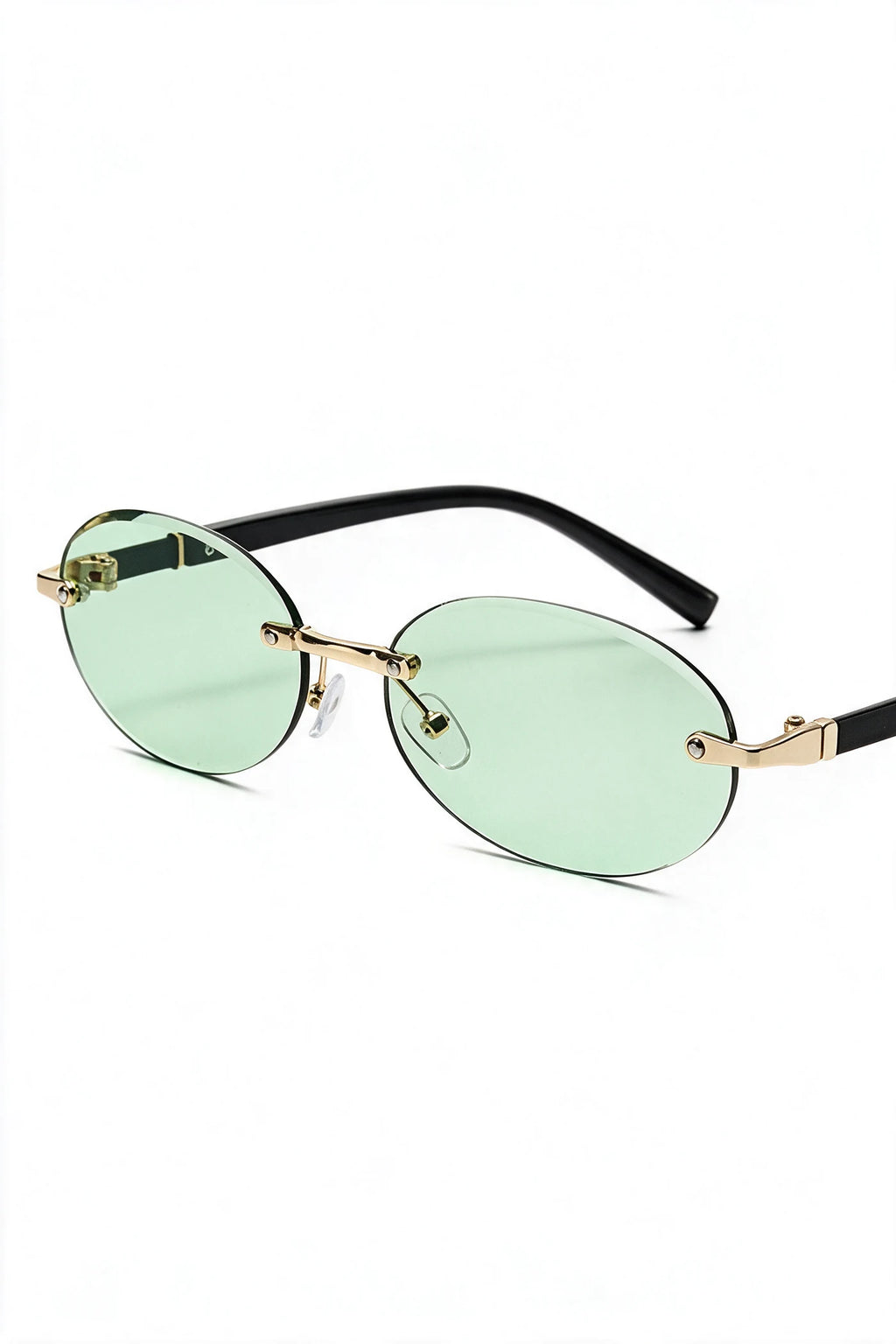 SERA rimless oval sunglasses in pale sage, three-quarter view with temples open