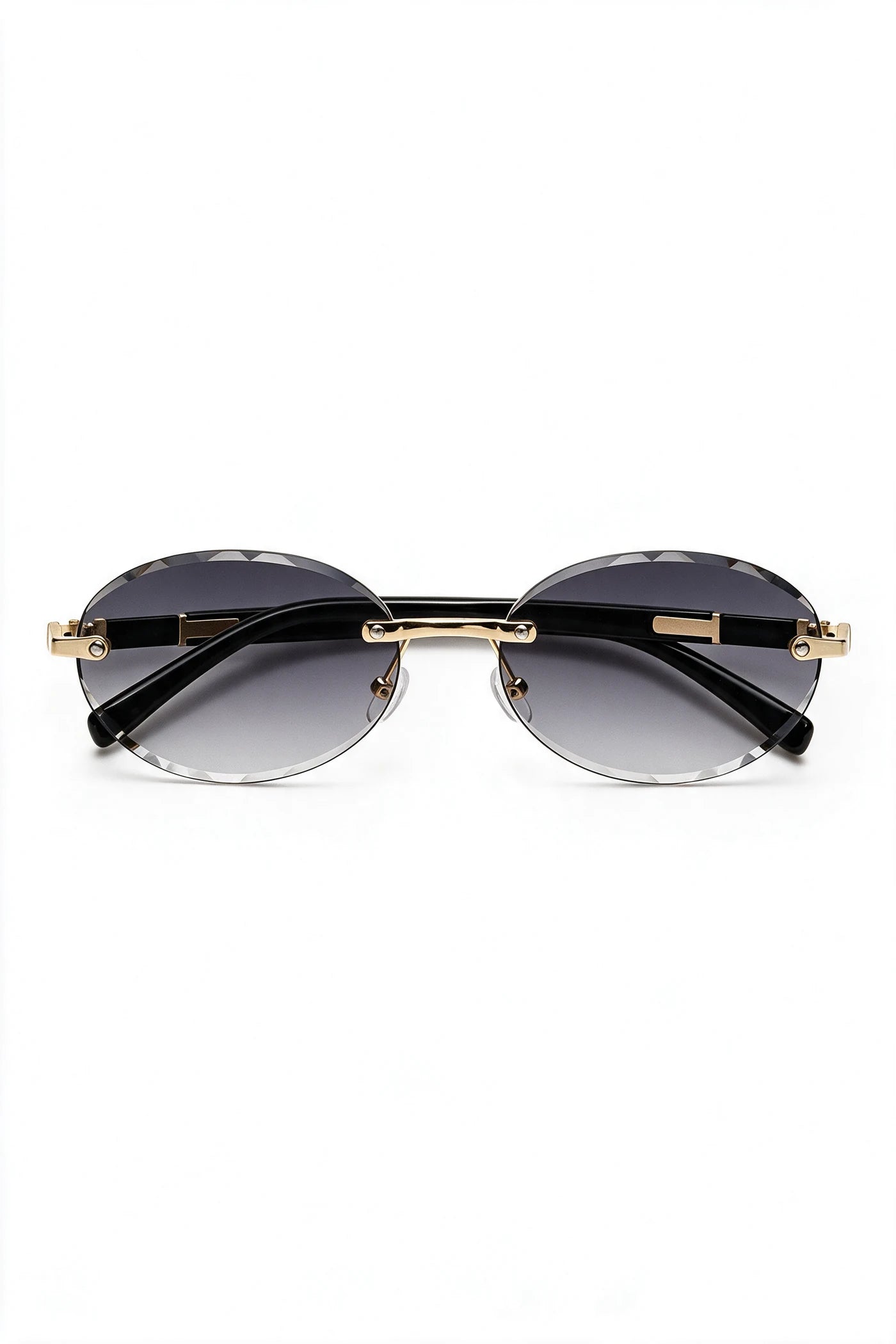 SERA rimless oval sunglasses with gradient smoke lenses and gold hardware, front view