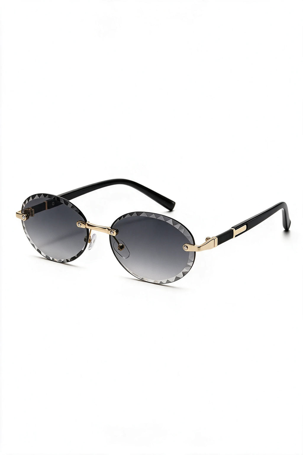 SERA rimless oval sunglasses in gradient smoke, three-quarter view with temples open