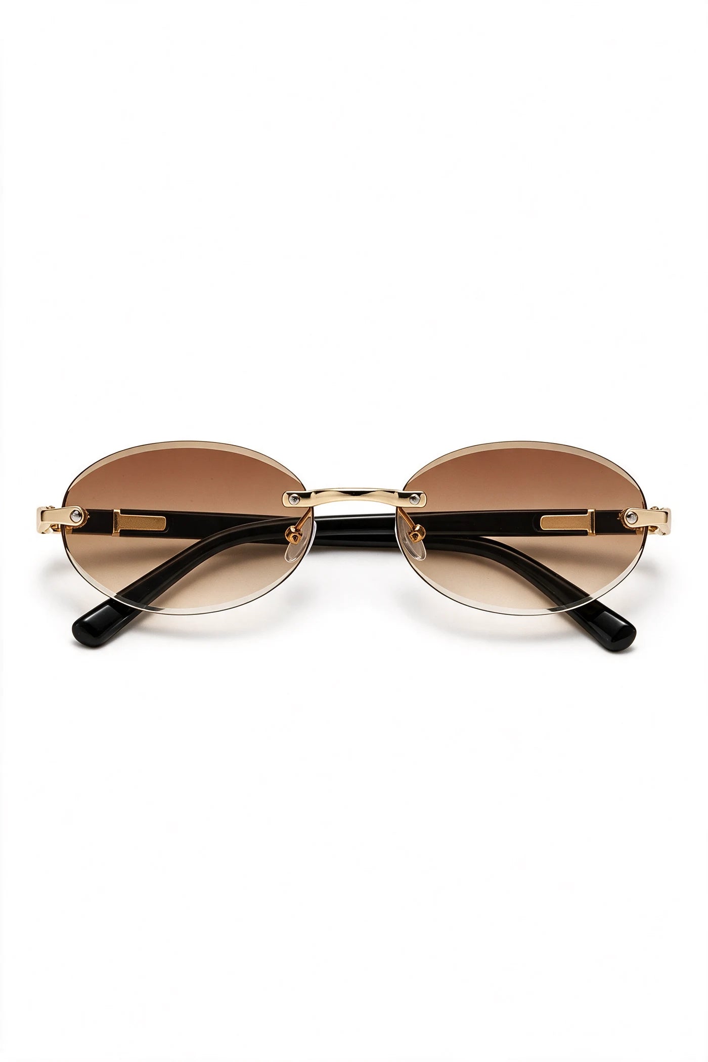 SERA rimless oval sunglasses with gradient tea lenses and gold hardware, front view