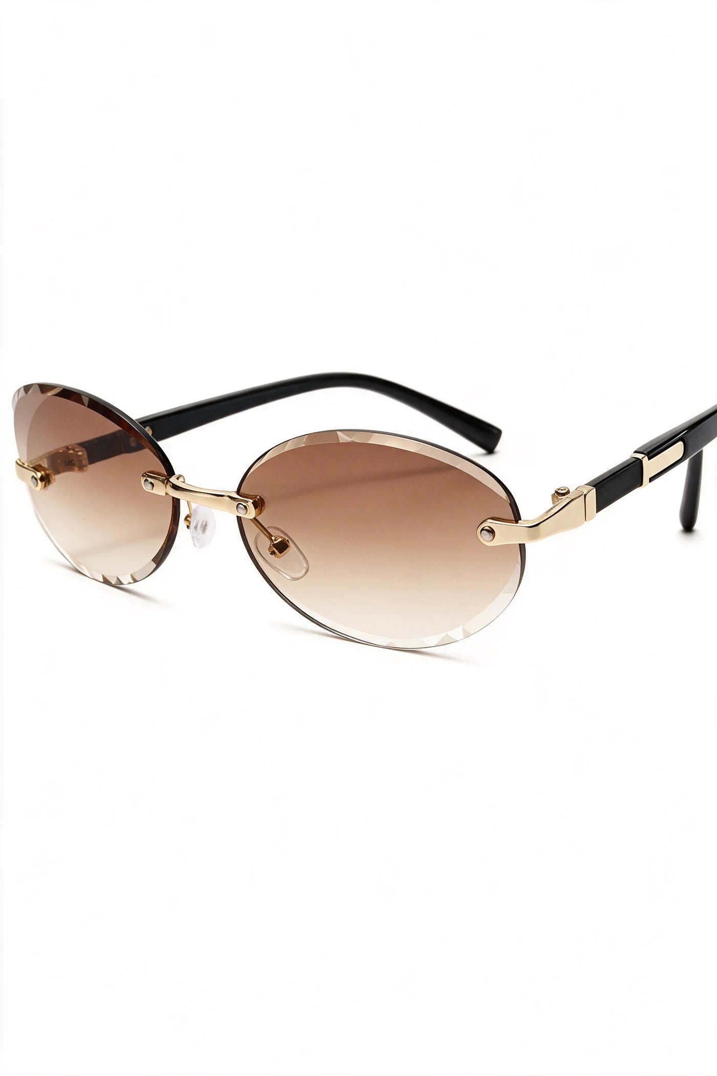 SERA rimless oval sunglasses in gradient tea, three-quarter view with temples open